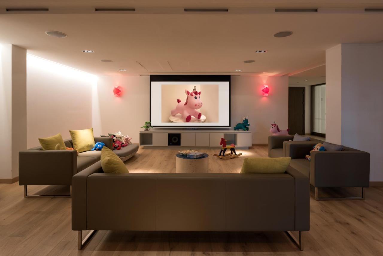 Amara - Sea Your Only View™ ليماسول المظهر الخارجي الصورة A home theater